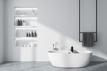 Naklejka na ściany i meble Light bathroom interior with bathtub and accessories. Mockup wall