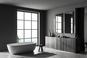 Fototapeta na wymiar Corner view on dark bathroom interior with bathtub, panoramic window