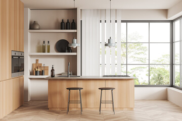 Front view on bright kitchen room interior with panoramic window