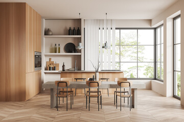 Light kitchen interior with bar countertop, eating table and panoramic window