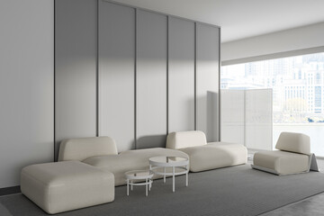 Corner view on bright living room interior with sofa, armchair