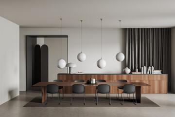 Stylish meeting room interior with office table, chairs and drawer with decor