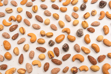 A group of almonds, pistachios, walnuts, macadamia, cashews.