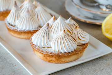Lemon meringue tarts -  traditional French and Italian dessert