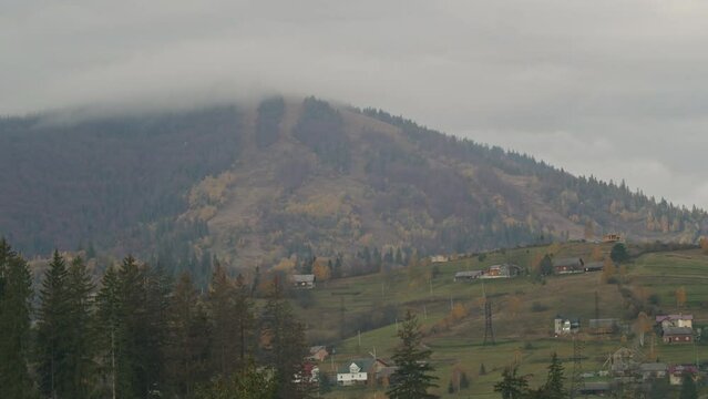 autumn carpathians, slavske, western ukraine, timelapse in the mountains, clouds and fog fly by quickly.