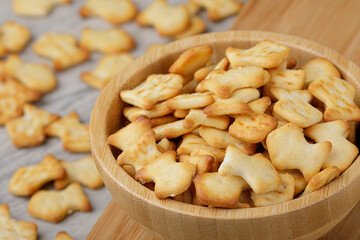 Wooden bowl of delicious goldfish crackers
