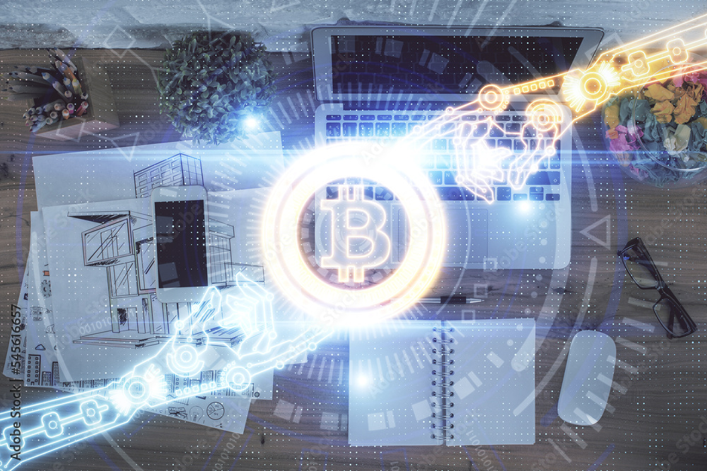 Poster Blockchain theme hologram drawings over computer on the desktop background. Top view. Double exposure.