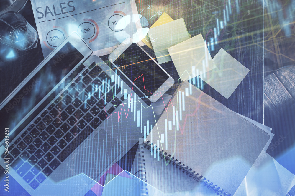 Poster financial market graph and top view computer on the desktop background. multi exposure. investment c