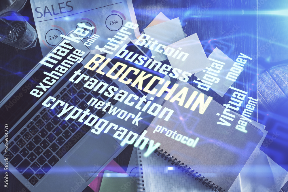 Poster blockchain theme hologram drawings over computer on the desktop background. top view. double exposur