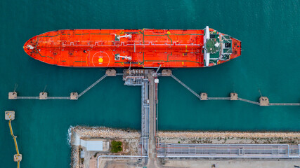 Aerial top view industrial crude oil fuel tanker ship at terminal industrial port,  Tanker ship...