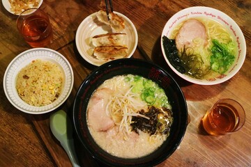 Dining scene of Japanese cuisine, ramen and pan-fried dumplings and fried rice