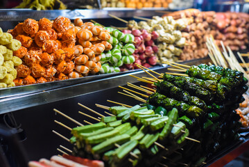 Many snacks and seafood in vietnamese night market in Da Lat