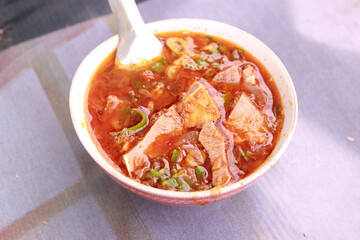 bowl of soup with basil