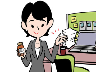 オフィスで錠剤を飲む会社員