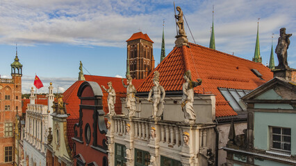 Fototapeta premium Beautiful view of Artus Court, Gdansk Town Hall and Basilica in Gdansk, Poland. Drone view in early fall.