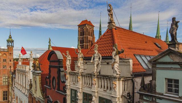 Beautiful view of Artus Court, Gdansk Town Hall and Basilica in Gdansk, Poland. Drone view in early fall.