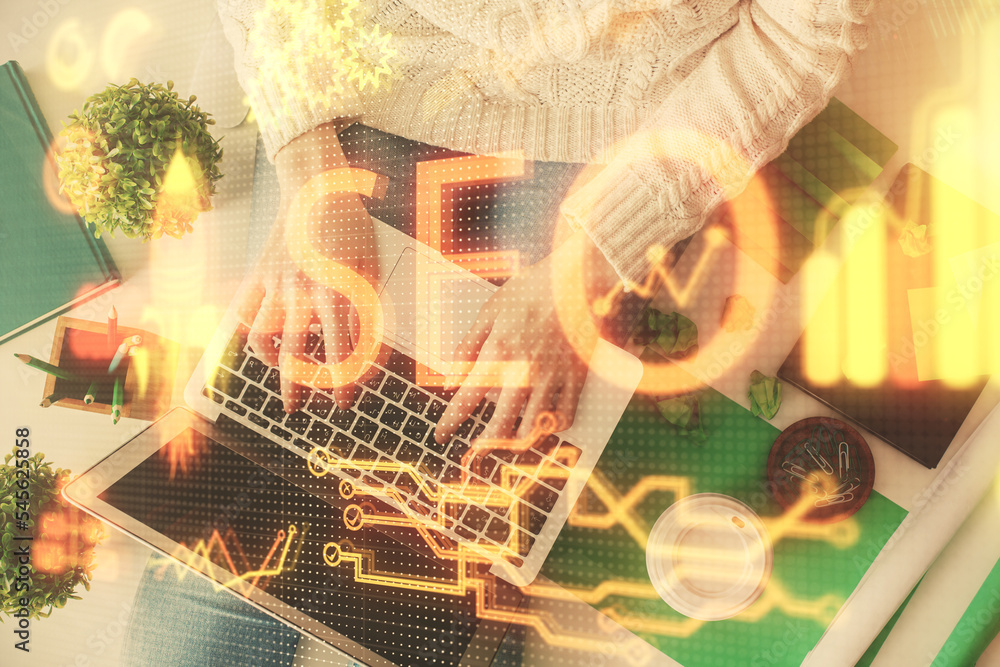 Poster double exposure of woman hands working on computer and seo hologram drawing. top view. search optimi