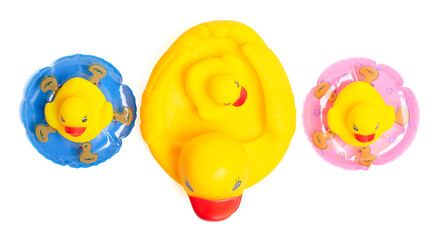 Top view collection of yellow rubber ducks family on white Background.