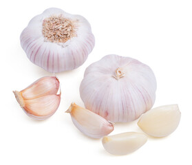 Top view fresh peeled garlic cloves, bulb with garlic slices on white background.