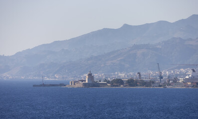 Downtown City by the Sea with mountain background. Messina, Sicilia, Italy. Sunny Morning.