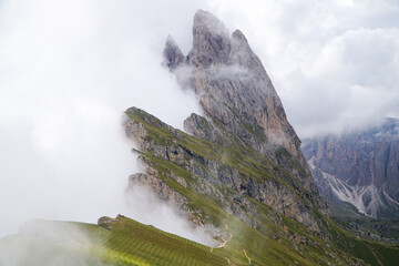 Wonderful and famous dolomite mountains: View to Odles group on a cloudy day. Specacular view from seceda peak. picturesue landscape in south tyrol, italy, garda valley. puez odles nature park.	