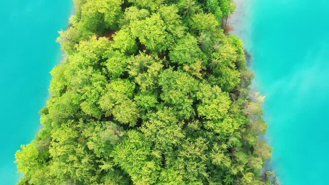 Faaker See lake in Carinthia, Austria. Aerial shot of an island in an Austrian Lake