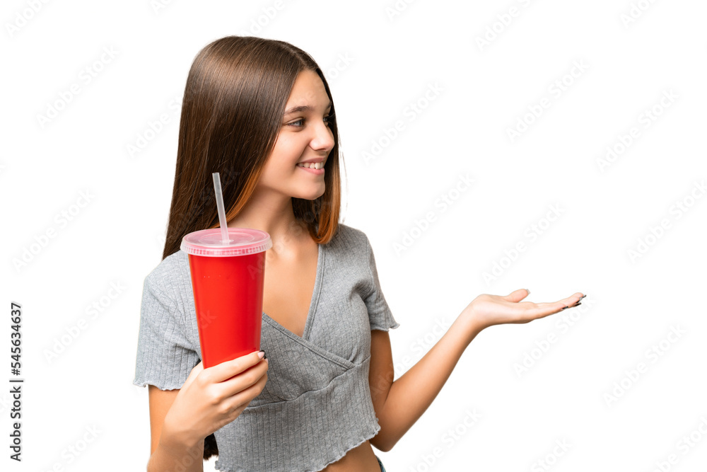 Canvas Prints Teenager caucasian girl holding a soda over isolated background with surprise facial expression