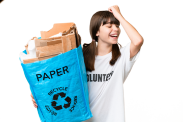 Little Caucasian girl holding a recycling bag full of paper to recycle over isolated background has realized something and intending the solution