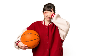 Little caucasian girl playing basketball over isolated background covering eyes by hands. Do not want to see something