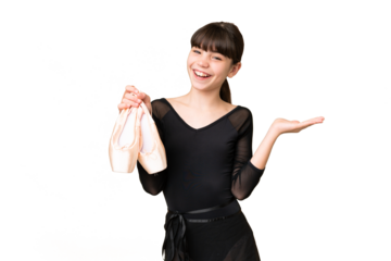 Little caucasian girl practicing ballet over isolated background with shocked facial expression