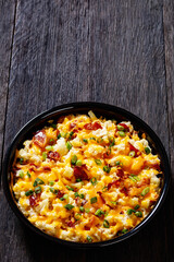 cauliflower bacon cheese casserole in baking dish