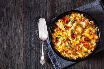cauliflower bacon cheese casserole in baking dish