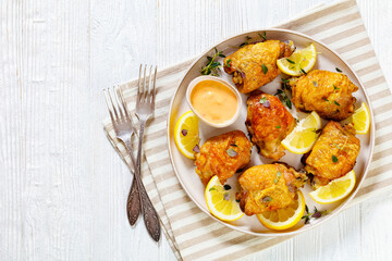 roast chicken thighs with lemon, thyme and spices