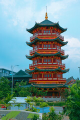 A Pagoda in the center of a Chinatown with the statue of Guan Yin.