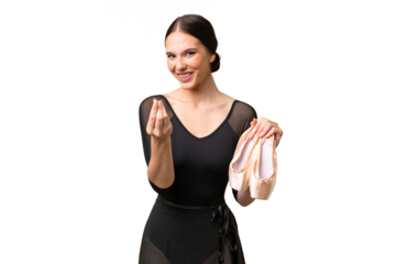 Young caucasian woman practicing ballet over isolated background making money gesture