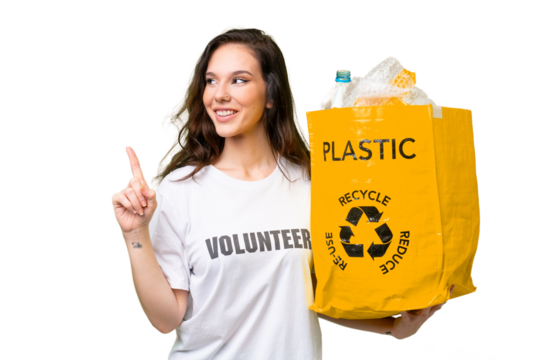 Young caucasian woman holding a bag full of plastic bottles to recycle over isolated background intending to realizes the solution while lifting a finger up