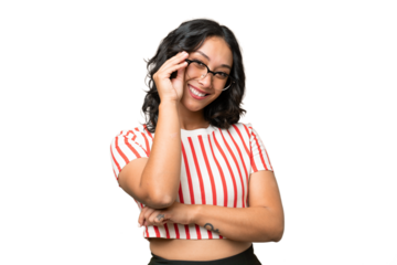 Young Argentinian woman over isolated background with glasses and happy