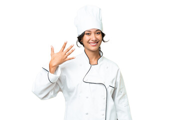 Young chef Argentinian woman over isolated background counting five with fingers