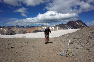 Man hiking on high plateau in Patagonia Andes mountains, Nahuel Huapi National Park in Argentina, Trekking with backpack adventure remote nature of South America