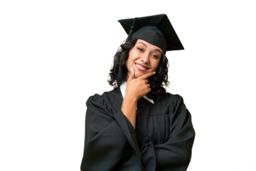Young university graduate Argentinian woman over isolated background smiling