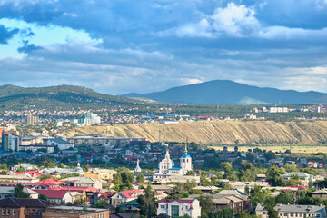 Fototapeta na wymiar Ulan-Ude, Russia - July 20, 2022: Panoramic view from the height of the city in summer on a bright sunny day.