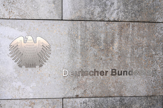 Berlin, Germany - November 03, 2022: The German Bundestag (Deutscher Bundestag) logo on Eingang Wilhelmstraße bulding.