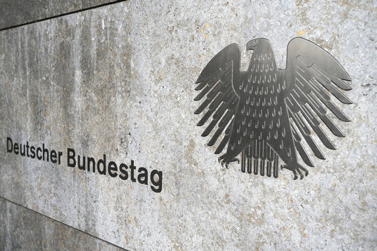 Berlin, Germany - November 03, 2022: The German Bundestag (Deutscher Bundestag) logo on Eingang Wilhelmstraße bulding.