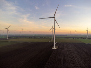 wind farm in the sunset