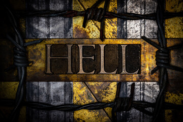 Hell text with barbed wire on grunge textured copper and gold background