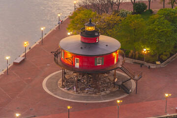 Red lighthouse at night, the Inner Harbor in Baltimore, Maryland