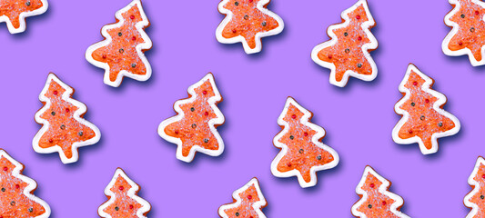 Fototapeta na wymiar Christmas gingerbread on a bright purple background.Christmas background. Festive