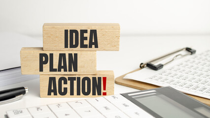 Idea Plan Action symbol. Wooden blocks with words Idea Plan Action