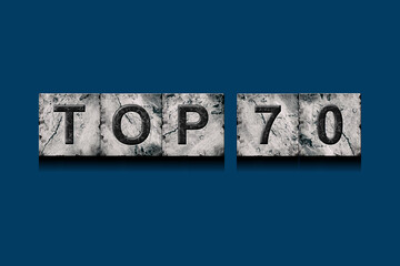 Top 70, words, above different numbers, on a dark blue background. Alphabet on stone blocks.Rating. Rating concept.