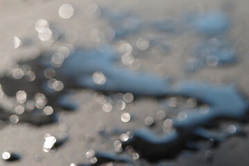 Blurre background of water drops on the wet floor